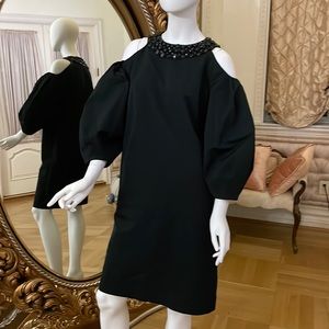 This cocktail dress very unique elegant and trendy beaded detail around neckline